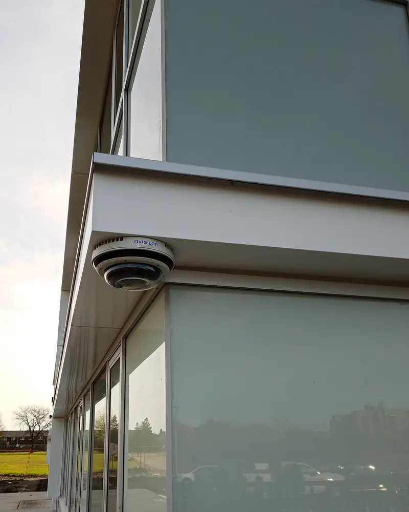 Multi-sensor camera under the corner of a glazed canopy.